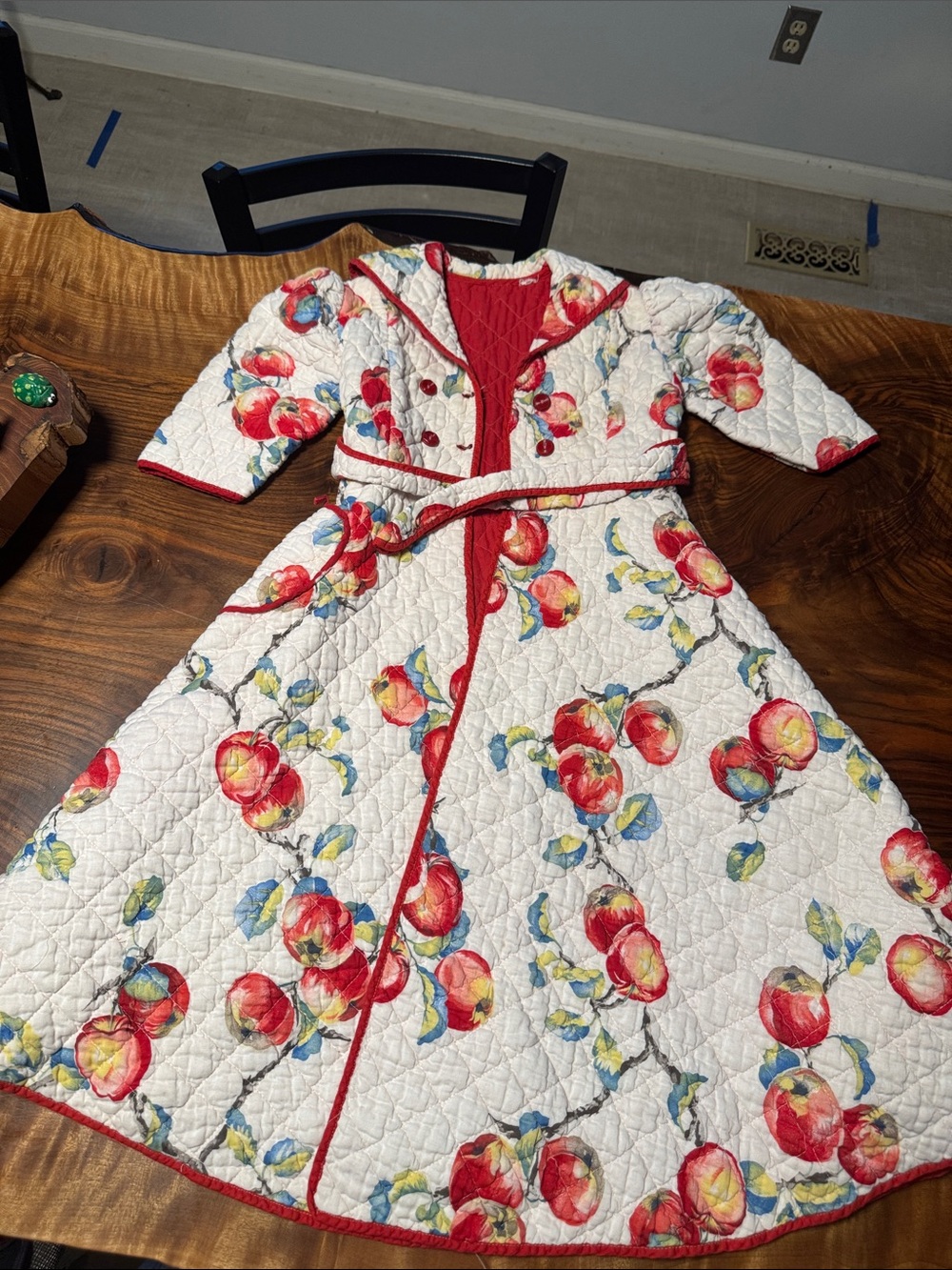 Kids apple printed long pea coat with buttons and a tie.